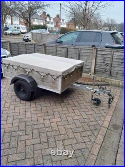 5ft x 4ft Utility Trailer With Tailgate, Spare Wheel, Cover & Lockable Hitch 5ft x 4ft Utility Trailer With Tailgate, Spare Wheel, Cover & Lockable Hitch
