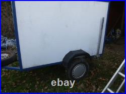 6 ft by 3.5 ft by 4ft 750 Kg covered trailer with rear door good condition