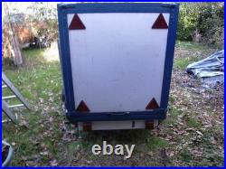 6 ft by 3.5 ft by 4ft 750 Kg covered trailer with rear door good condition