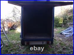 6 ft by 3.5 ft by 4ft 750 Kg covered trailer with rear door good condition