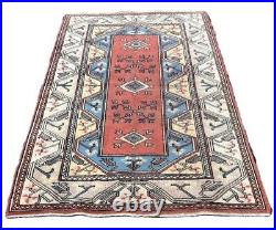 A CHARMING OLD HANDMADE TRADITIONAL TURKISH WOOL ON COTTON RUG (190 X 127 cm)X A CHARMING OLD HANDMADE TRADITIONAL TURKISH WOOL ON COTTON RUG (190 X 127 cm)X