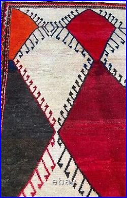 A STYLISH OLD HANDMADE TRADITIONAL ORIENTAL WOOL ON COTTON RUG. (225 X 150 cm)