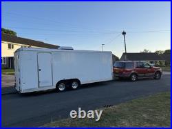 American Trailer could be race car enclosed trailer / race shuttle / race car