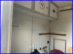 American Trailer could be race car enclosed trailer / race shuttle / race car