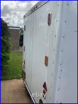 American Trailer could be race car enclosed trailer / race shuttle / race car