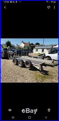 Brian James Tilt Bed double axle trailer with tyre rack