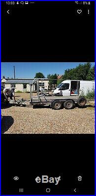 Brian James Tilt Bed double axle trailer with tyre rack