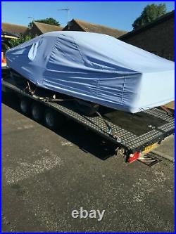 Brian James tilt bed covered car trailer