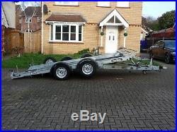 Car transport trailer tilt and ramps fountain trailers