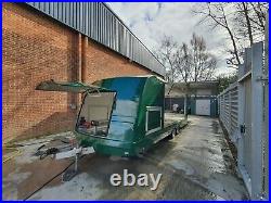 Covered enclosed car trailer