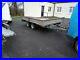Indespension_flat_sided_trailer_with_ramps_used_01_du