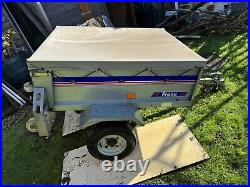 Metal trailer with cover