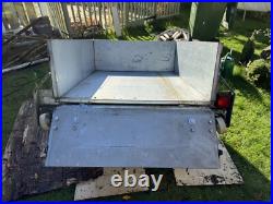 Metal trailer with cover