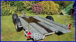 Space saving motorhome small car transporter / Brian James folding pole trailer
