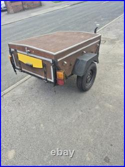 Trailer 123cm Long. 91.5cm Wide. 77cm High. With An Opening Lid On