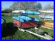 Trailer_6_Kayaks_And_A_Barrell_01_em