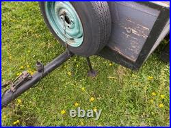 Trailer with opening tailgate