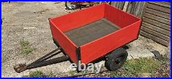 Used small car trailer wooden with metal frame